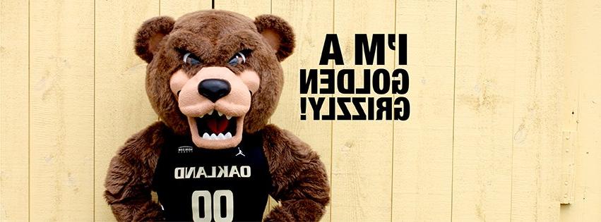 The Grizz O U's bear mascot with text reading I'm a Golden Grizzly